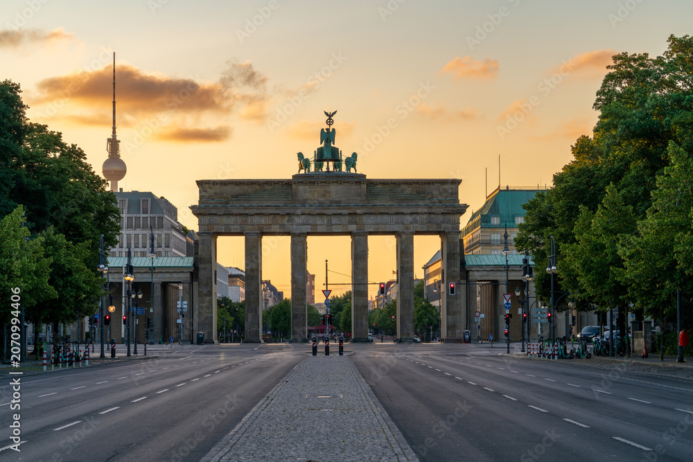 Naklejka premium The Brandenburg Gate at sunrise. Public landmark of Berlin, Germany not protected by copyright