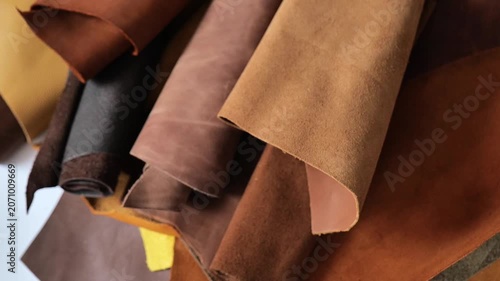 leather texture backdrop with soft folds.Genuine cow leather . Warm earthy tones.high quality brown natural leather. 