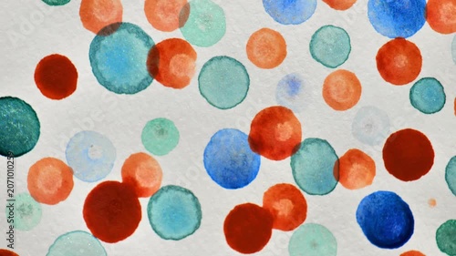 Watercolor polka dot pattern. Brown, blue and green polka dots on a beige background.Spring watercolor abstract background.Childrens parties, social media background. 4k footage