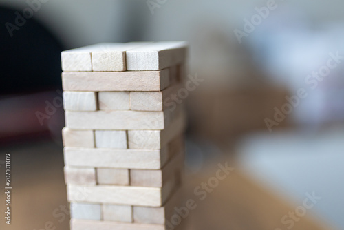 Fotografie Close-up of wooden tumbling tower balance game