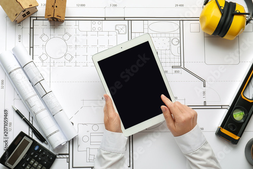 Person using tablet on arch...