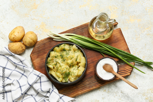 Bowl of tasty potato salad ...