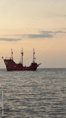 Historic Pirate Ship Sailing on Calm Miami Bay Waters at Golden Hour Sunset