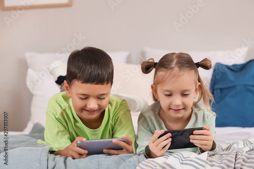 Cute happy little kids with...