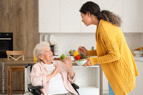 Elderly woman refusing food...