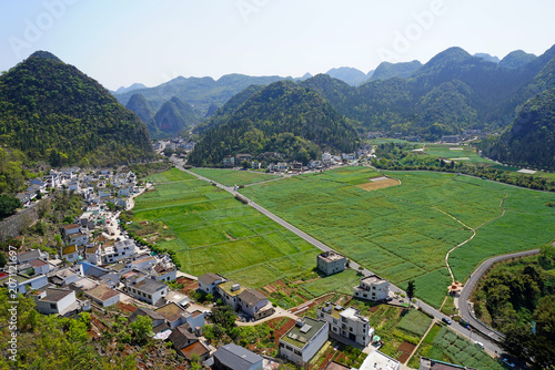 Guizhou, China 18MARCH2026 :A small rural village amidst the stunning scenery of Wanfenglin (Forest of Ten Thousand Peaks) national park in Xingyi, Guizhou, China