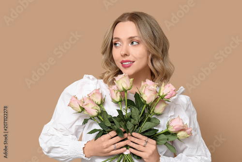Pretty young woman with bou...
