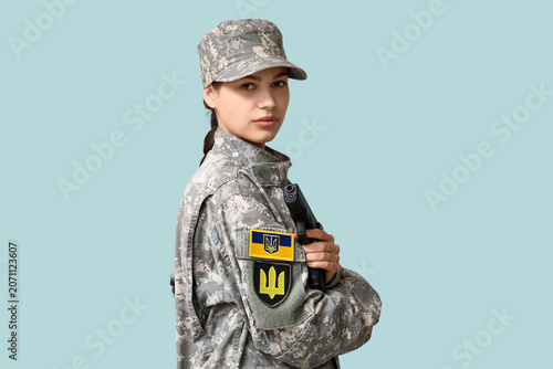 Female soldier in uniform w...