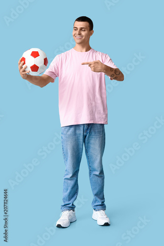 Handsome young man pointing...