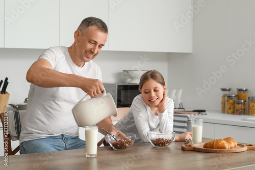 Little girl with her father...