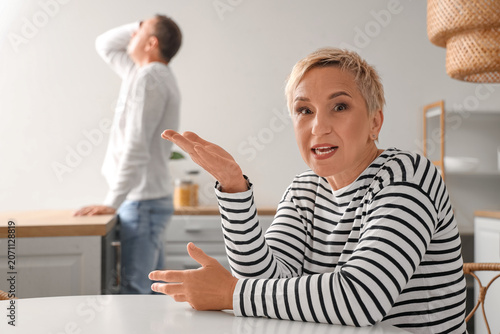 Mature woman quarreling wit...