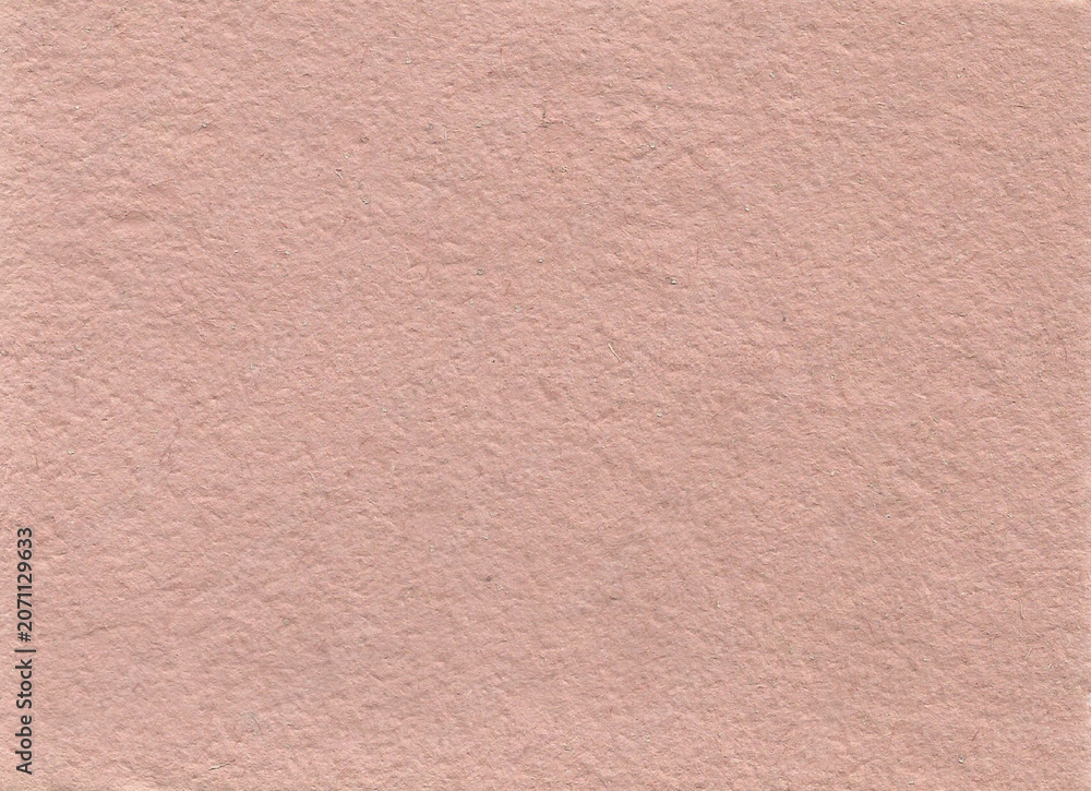 Fototapeta premium High-resolution blush pink handmade pressed paper texture canvas. The clean neutral pastel background features rustic mottled specks and a soft rough matte surface layer suitable for modern corporate