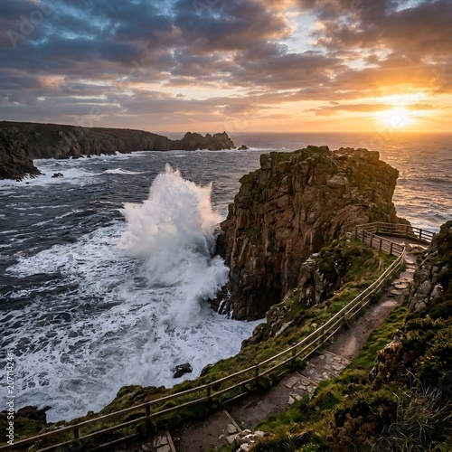 Dramatic cornish coastline at sunset waves crashing against rocky cliffs
