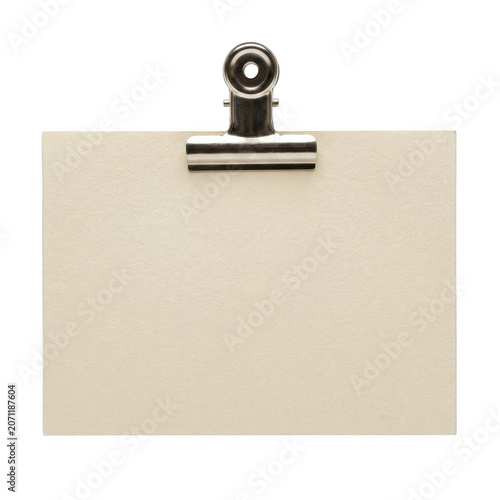 Blank paper note attached with a silver metal binder clip isolated on transparent background