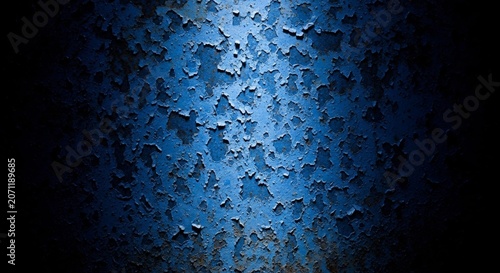 Abstract macro of dark blue oxidized metal sheet featuring mottled patina and decaying texture