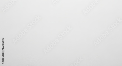 Ultra close up flat lay of white fiber based photo paper with a micro crystalline emulsion texture