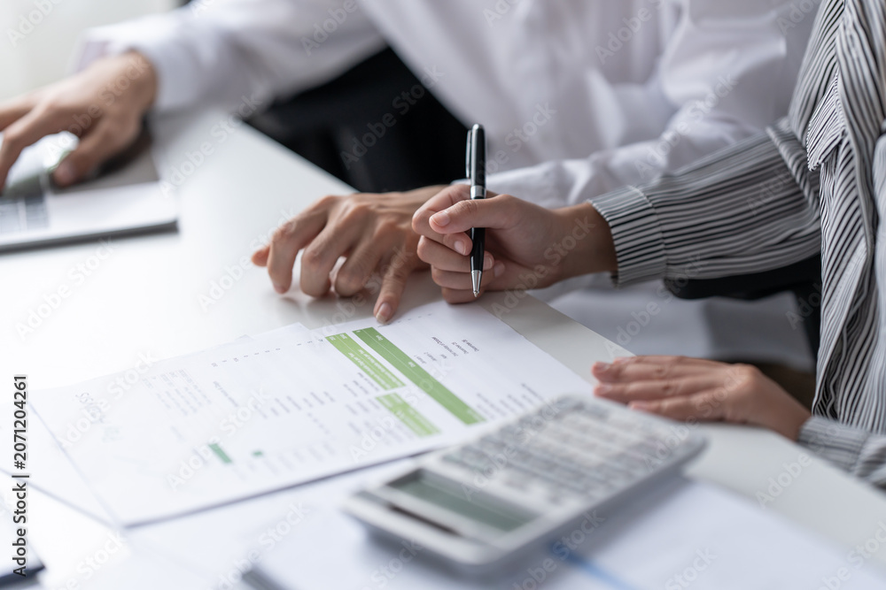 Naklejka premium Auditor or internal revenue service staff, Business women checking annual financial statements of company. Audit Concept.