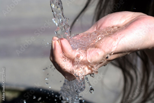 Hands Washing Under Flowing Fresh Water