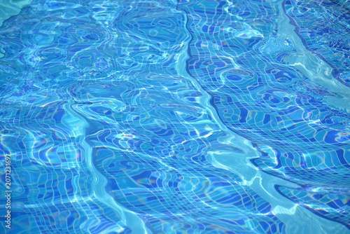 Shimmering Blue Swimming Pool Water with Mosaic Tile Pattern