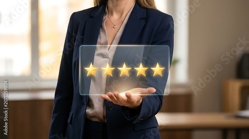 Business woman holding glowing golden five star rating hologram inside transparent rectangular glass panel interface.