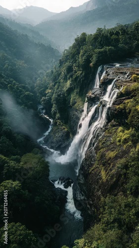 Tropical Waterfall in Lush Green Rainforest

