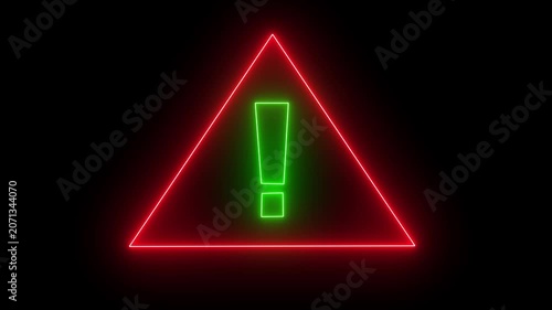 Red triangle and green warning sign with exclamation mark isolated on a black background.