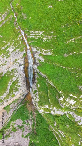 Shaghot Waterfall,  Close-Up View of Mountain Waterfall Flowing Through Limestone Canyon Walls