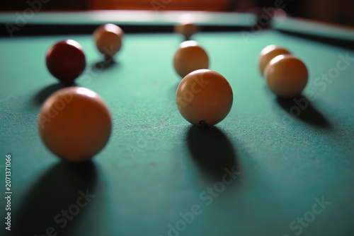Fotografie Russian billiard balls, cue, triangle, chalk on a table Green cloth Copy space