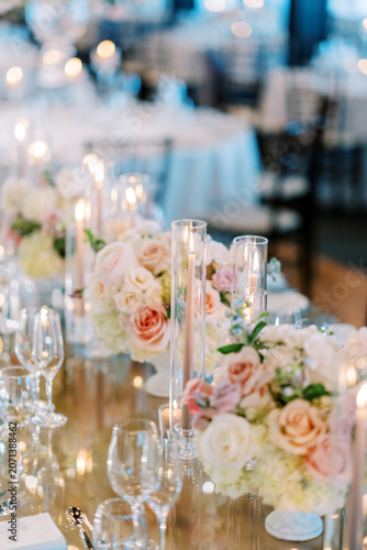 Elegant wedding reception table with floral arrangements