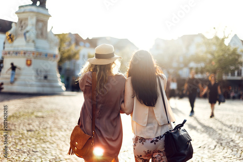 Two female friends enjoying european city tourism