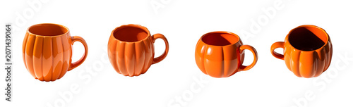 A glossy orange pumpkin-shaped mug sits on a white surface, casting a soft shadow on transparent background
