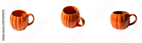 A glossy orange pumpkin-shaped mug sits on a white surface, casting a soft shadow on transparent background