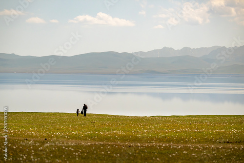 Man and Child by Son Kul Lake Kyrgyzstan