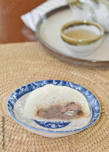Chinese bun with a bite mark