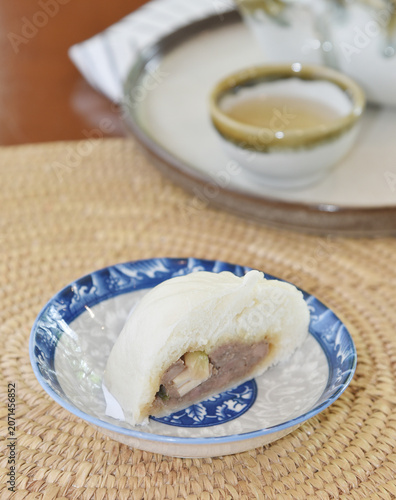 Chinese bun with a bite mark