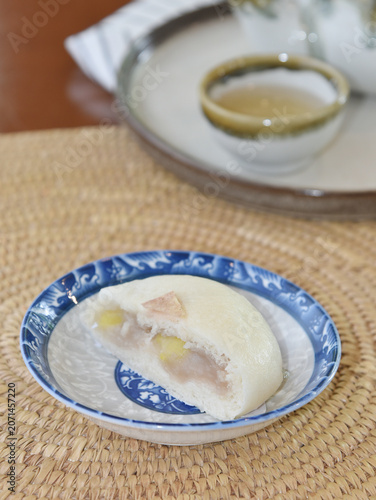Chinese bun with a bite mark