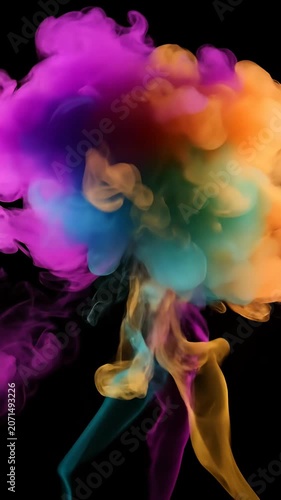 Colorful smoke clouds rising against black background