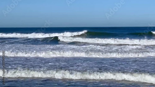 Panoramic view of stormy ocean waves along the coast

