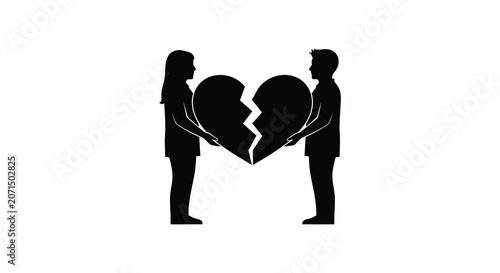 Obraz na płótnie Couple holding broken heart halves in a black silhouette