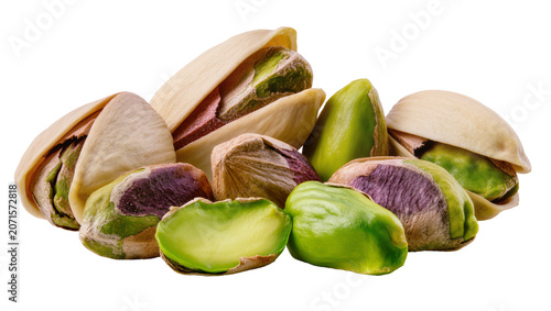 Pile of shelled and unshelled pistachios with vibrant green kernels, isolated on transparent background