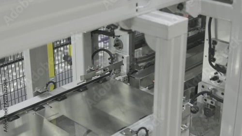 Conveyor rail system. Material box handling, Industrial automation. Precision transport system in Smart factory.