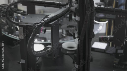 High speed inspection machine. Automation factory working high precision photo defect detector photograph quality control.