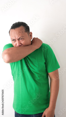 health problem and people concept - unhealthy asian man coughing, isolaited white background