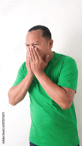 health problem and people concept - unhealthy asian man coughing, isolaited white background