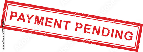 Foto A vibrant red grunge rubber stamp displaying 'PAYMENT PENDING' text, signifying an incomplete financial transaction status or process