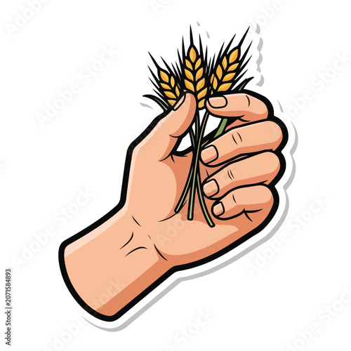 A hand holding wheat