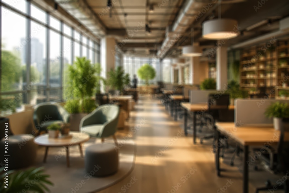 Fototapeta premium Blurred modern office interior coworking space business workplace architecture green plants desks light background