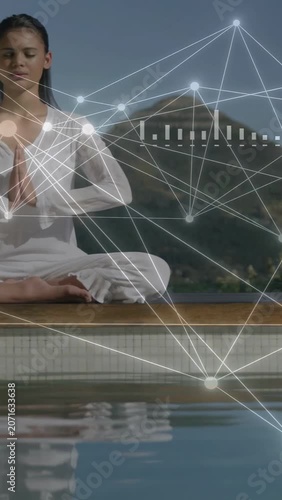 Vertical video: Teen meditating on pool ledge breath tracking bio readout HUD crossing reflection