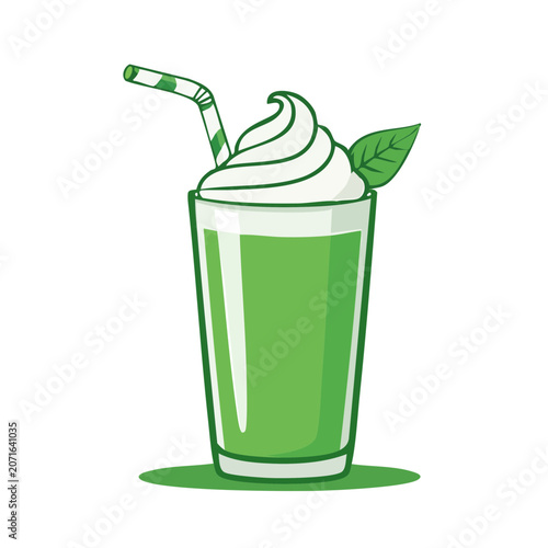Green smoothie in glass with whipped cream and leaf