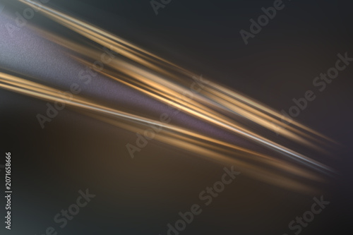 Canvas Print Abstract image featuring smooth, elongated streaks of light in warm golden and purple hues, creating a dynamic flow across a dark background